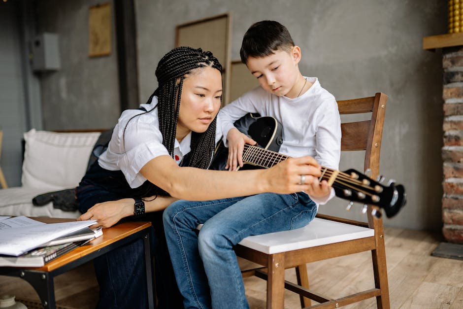 Professional music instructor teaching piano in modern studio environment